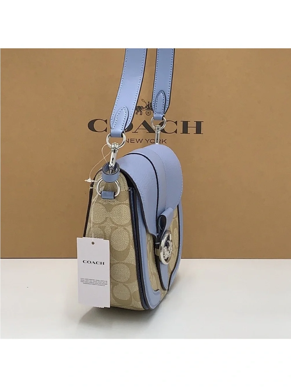 COACH Georgie Saddle Bag In Signat Canvas COLOR:
Silver/Light Khaki/Marble
Blue - Picture 8 of 16